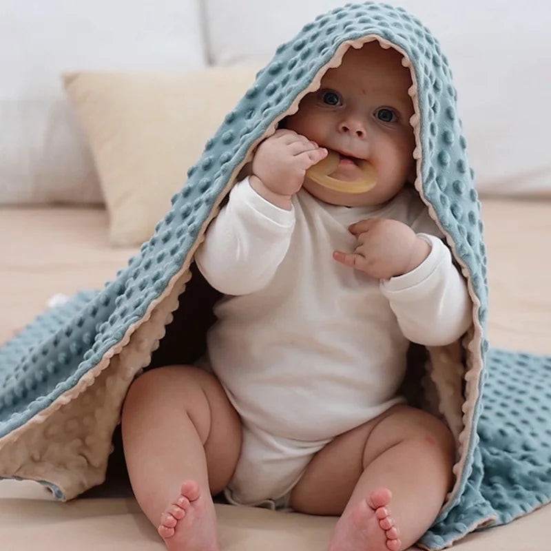 couverture-bébé-bleu-beige-sécurisante