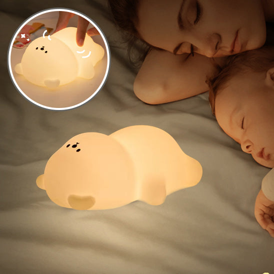 bébé-veilleuse-ours-couché-luminosité-chaleureuse