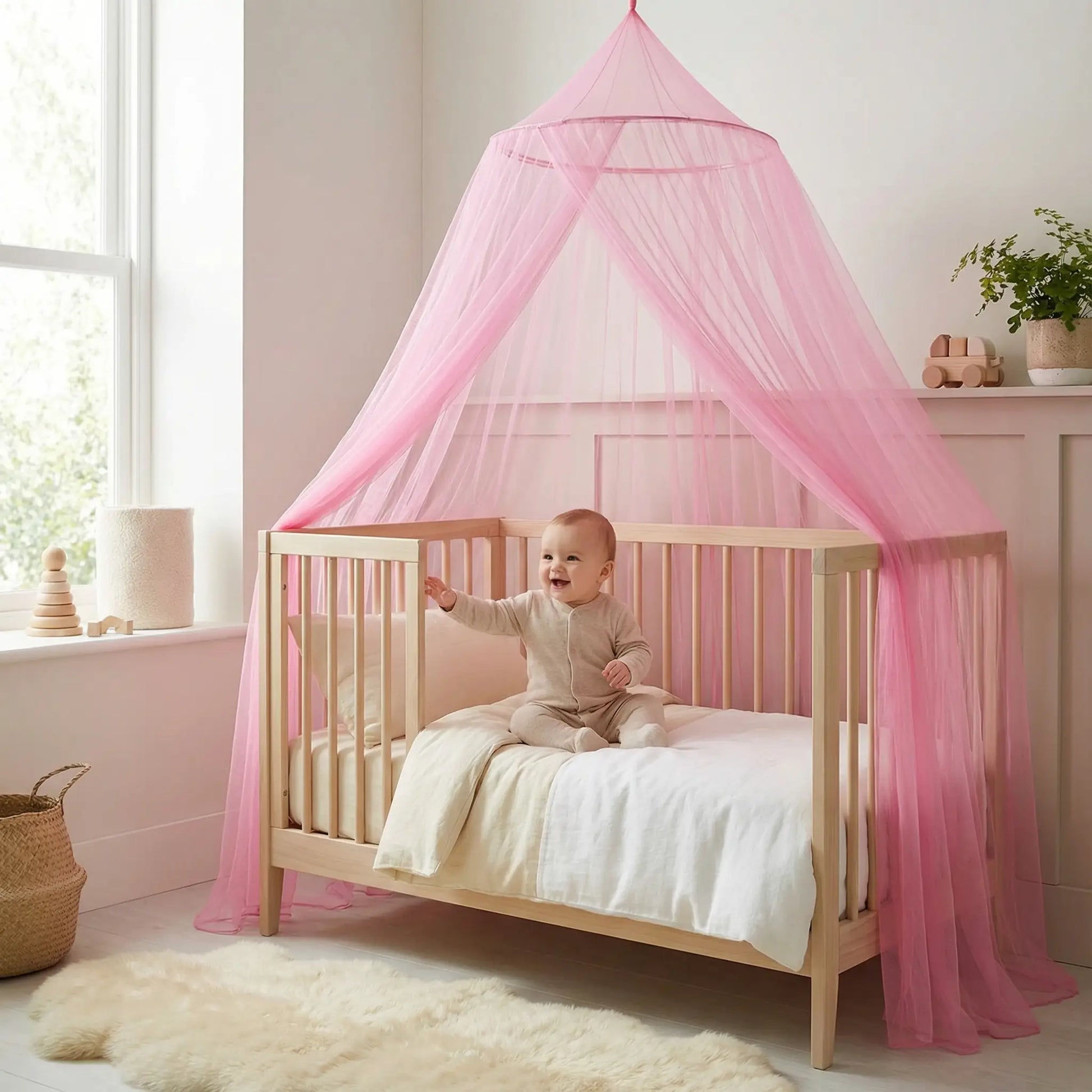 ciel-de-lit-bebe-pailleté-rose-sécuritaire