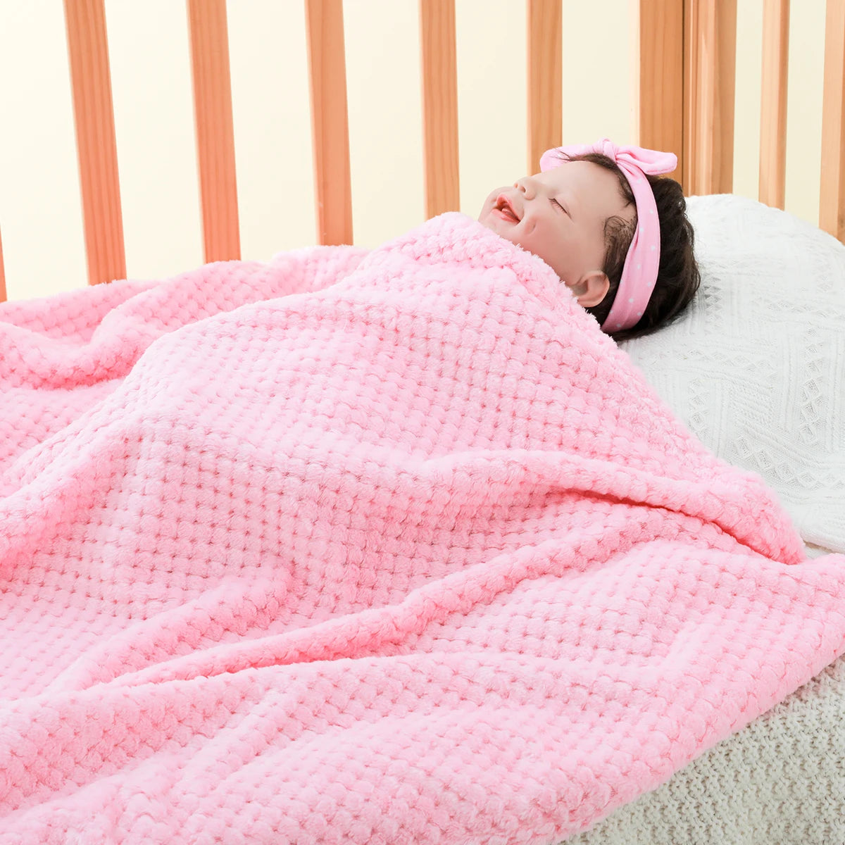 couette-pour-bébé-velours-corail-sommeil-profond