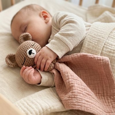 Doudou bébé rose poudré réconforte et doux pour bébé