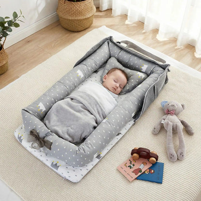 nid-bébé-gris-couronne-gris-confortable