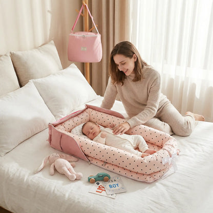 nid-pour-bébé-rose-picoté-rose-douillet