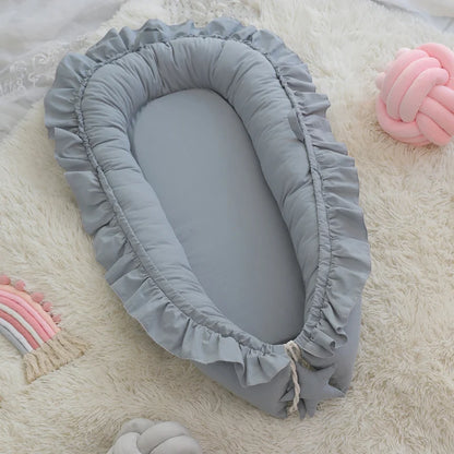 réducteur-de-lit-bébé-bleu-confortable-sécuritaire