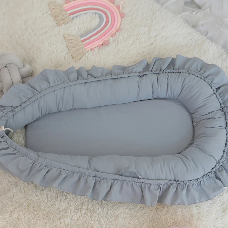 réducteur-de-lit-bébé-bleu-doux-innovant