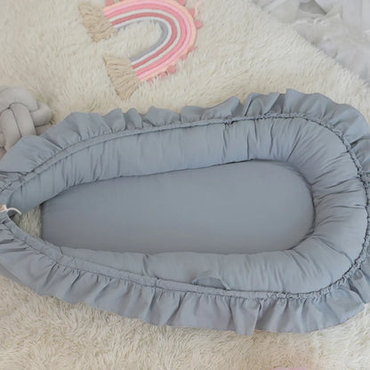 réducteur-de-lit-bébé-bleu-doux-innovant