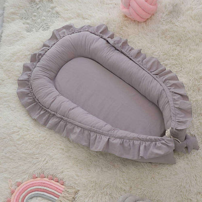 réducteur-de-lit-bébé-gris-tissu-respirant