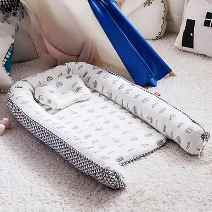 reducteur-de-lit-bebe-nidportablebebe-couronne-tissu-respirant