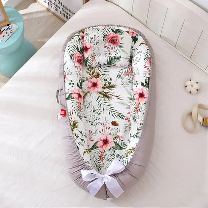 reducteur-de-lit-nidportablebebe-fleurs-haute-qualiter